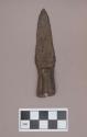 Metal, copper alloy projectile point, rolled stem, perforated at end of stem