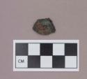 Metal, copper alloy sheet fragment, with possible iron nail or rivet