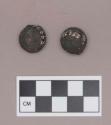 Metal, dome shaped beads, perforated, covered with silver and copper alloy, possibly wood