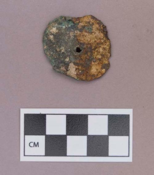 Metal, copper alloy ear spool fragment