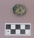 Metal, copper alloy ear spool fragment