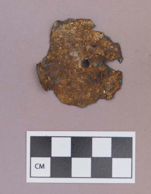 Metal, copper ear spool fragment, with possible silver or mica on surface