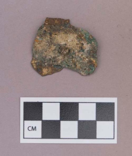 Metal, copper alloy ear spool fragment