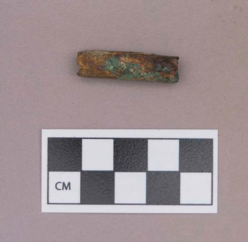 Metal, copper alloy tube, likely bead