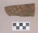 Metal, flat iron fragment, perforated at one end