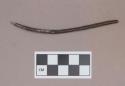 Metal, copper alloy wire fragment, pointed at one end, possible awl