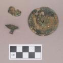 Metal, copper alloy ear spool fragments, one with mica fragment adhered