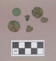 Worked animal bone discs, with copper alloy sheet covering, some wrapped in fiber; possible buttons