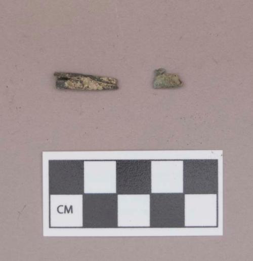 Metal, rolled copper alloy tubes, likely beads