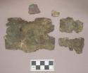 Metal, copper alloy sheet fragments, two with perforations