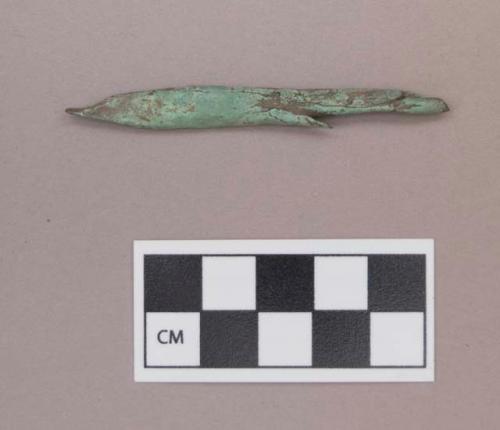 Metal, copper alloy cylindrical fragment, pointed at one end, possible perforator