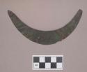 Metal, copper alloy sheet ornament, crescent shaped, two peforations
