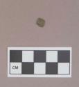Metal, copper alloy sheet fragment, curved