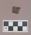 Metal, copper alloy sheet fragment, folded edges