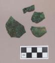 Metal, copper alloy sheet fragments, one with possible bone fragments or bone impressions on it; two fragments crossmend