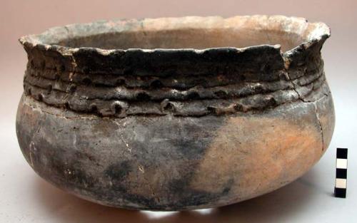 Pot with hole in bottom for firing pottery