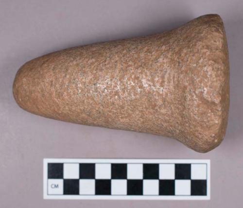 Ground stone, cone shaped maul with flat base