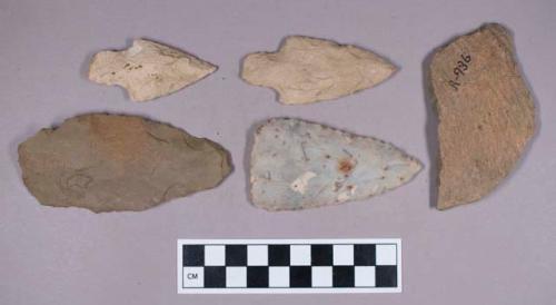 Chipped stone and earthenware, ovate, stemmed, corner-notched, and side-notched bifaces with impression decorated rim and body sherds