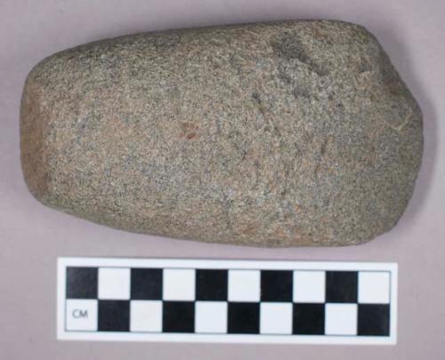 Ground stone, adze with rounded end