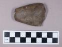 Ground stone, celt fragment with tapered end