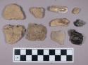 Earthenware, stone, charcoal, bone, fragments with secondary flakes and body sherds