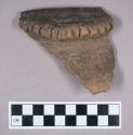 Ceramic, earthenware, rim sherd with incised decoration