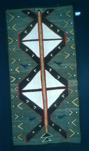 Standard design rug with bird motifs