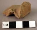 Pottery handle fragment - red slipped
