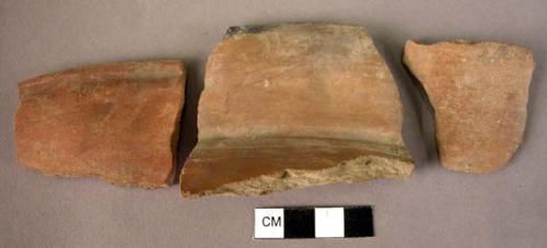 9 rim potsherds, 2 sherds, 1 neck sherd of a vessel, 1 fragment of a base - plai