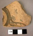 Potsherd of a plate (?) - conventionalized naturalism