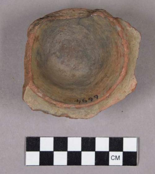 Ceramic, earthenware base sherd, flared base and rim, undecorated