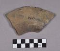 Ceramic, earthenware rim and body sherds, incised, dentate, and red slipped, includes one possible handle sherd with incised "T" on surface