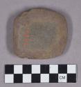 Ground stone, notched axe