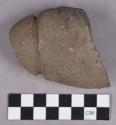 Ground stone, fragment, grooved