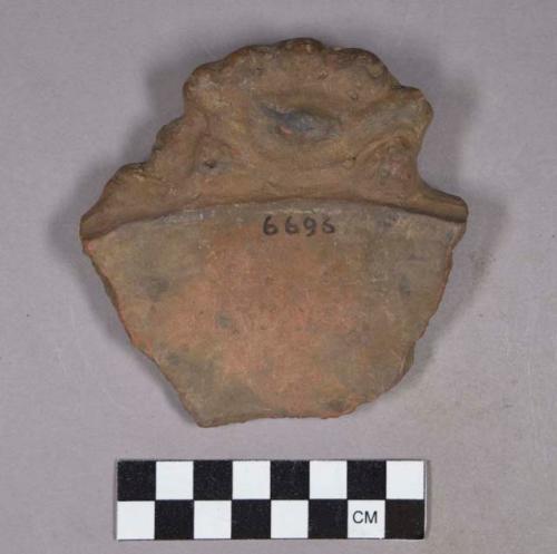 Ceramic, earthenware rim sherd with modeled handle