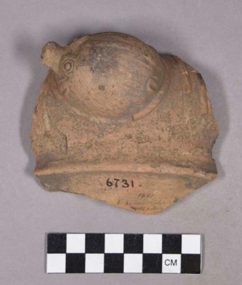 Ceramic, earthenware body sherd, with modeled zoomorphic head