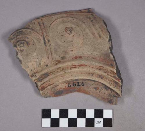 Ceramic, earthenware body sherd, modeled and red-slipped