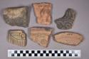 Ceramic, earthenware rim, body, and base sherds, polychrome slipped, carved, incised, and modeled