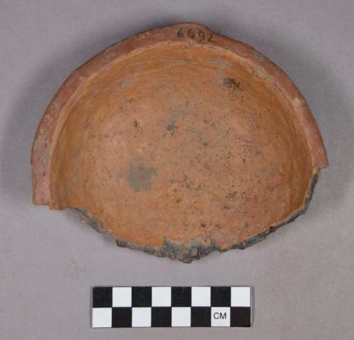 Ceramic, earthenware partial vessel, red-slipped rim