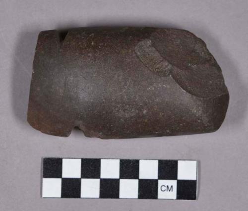 Ground stone, notched axe