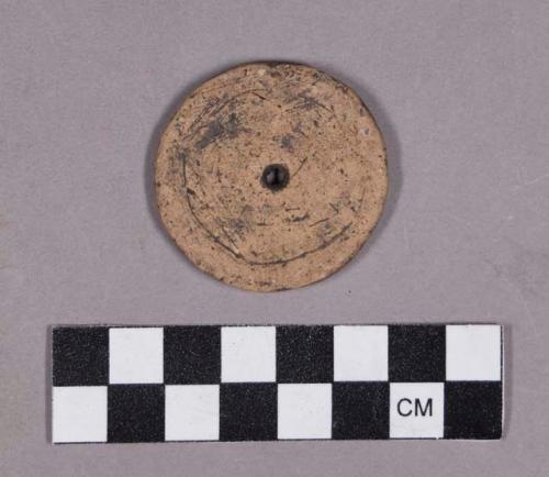 Ceramic, earthenware disk, perforated