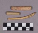 Organic, utilized antler, cylinder-shaped with flat ends, possible punches, and utilized bone fragment, burnished