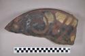 Ceramic, earthenware partial vessel, oval-shaped with lugs, cord-impressed, polychrome and glazed exterior, polychrome interior; sherds crossmend with 89-38-30/54111 to form complete vessel