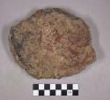 Ceramic, earthenware body sherds, shell-tempered, cord-impressed, red ochre on interior