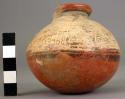 Pottery jar, base red, upper zone white with black ornamentation