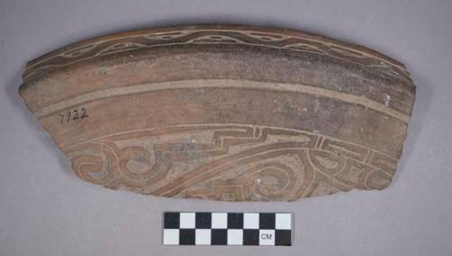 Earthenware rim and body sherd with incised designs