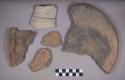 Earthenware rim and body sherds with modeled, carved, and incised designs, polychrome slipped