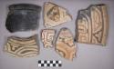 Earthenware rim, body, and base sherds with polychrome, incised and modeled designs