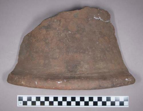 Earthenware rim and body sherd with incised designs