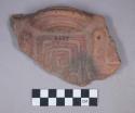 Earthenware rim and body sherd with incised designs on body and a modeled handle on rim